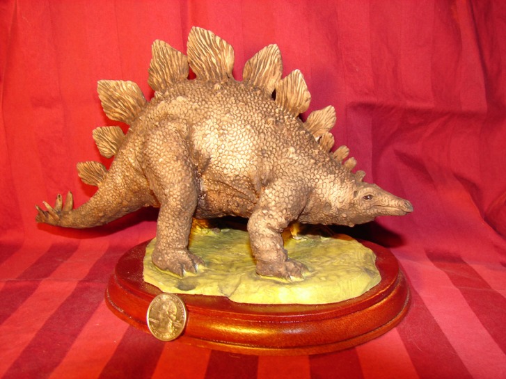 A Stegosaurus statuette.